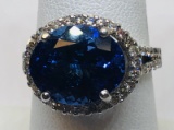 14KT WHITE GOLD 5.26CTS TANZANITE AND .80CTS DIAMOND RING