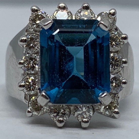 14KT WHITE GOLD 5.20CTS BLUE TOPAZ AND 1.00CTS DIAMOND RING
