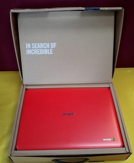 NEW IN BOX - RED ASUS LAPTOP (329.00 NEW ONLINE)