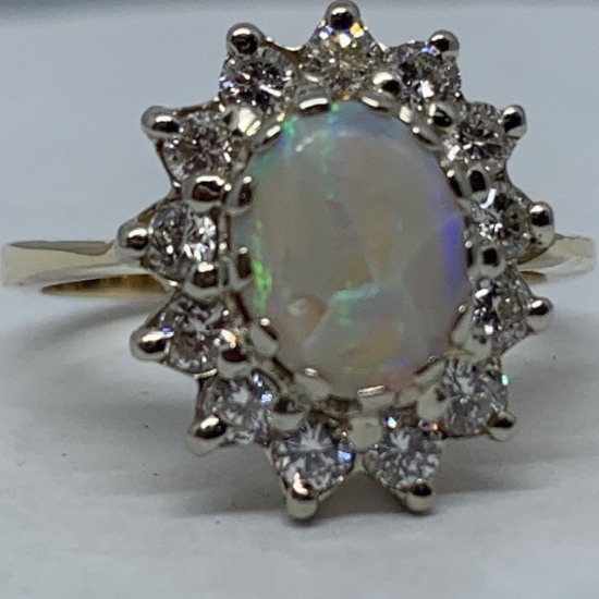 14KT YELLOW GOLD 1.75CTS OPAL AND .75CTS DIAMOND RING