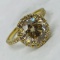14KT YELLOW GOLD 3.10CTS DIAMOND RING FEATURES 2.40CTS CENTER DIAMOND