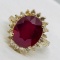 14KT YELLOW GOLD 9.76CTS RUBY AND 1.40CTS DIAMOND RING