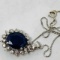 14KT WHITE GOLD 6.86CTS BLUE SAPPHIRE AND .65CTS DIAMOND PENDANT WITH CHAIN