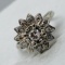 14KT WHITE GOLD 1.00CTS DIAMOND RING FEATURES .30CTS CENTER DIAMOND AND ANOTHER .70CTS AROUND