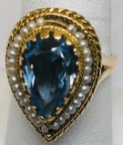 14KT YELLOW GOLD BLUE TOPAZ AND PEARL RING 8.00GRS