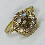 14KT YELLOW GOLD 3.10CTS DIAMOND RING FEATURES 2.40CTS CENTER DIAMOND