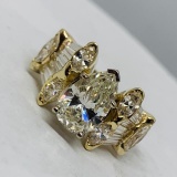 SPECTACULAR 14KT GOLD, 5.86cts TOTAL DIAMONDS FEATURING A 2.31cts PEAR CENTER DIAMOND