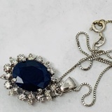 14KT WHITE GOLD 6.86CTS BLUE SAPPHIRE AND .65CTS DIAMOND PENDANT WITH CHAIN