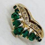 14KT YELLOW GOLD 2.05 CTS EMERALD AND .50CTS DIAMOND RING
