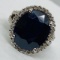 14KT WHITE GOLD , 12.66CT SAPPHIRE, & 0.86 DIAMOND RING