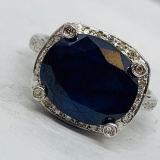 14KT WHITE GOLD, 7.20CTS SAPPHIRE & .29CT DIAMOND RING