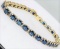 14 KT YELLOW GOLD 15.00CTS BLUE SAPPHIRE AND .50CTS DIAMOND BRACELET