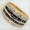 18KT YELLOW GOLD 1.10CTS BLUE SAPPHIRE AND .08CTS DIAMOND RING