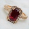14KT ROSE GOLD 1.77CTS RUBY AND .60CTS DIAMOND RING
