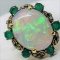 14 KT GOLD WITH 17 MM X 21 MM 10.5ct OPAL W/ 18 EA .02-.03 DIA. AND 6 EMERALDS, 12.8 GRAMS