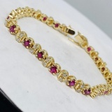 14KT YELLOW GOLD 3.00CTS RUBY AND 1.20CTS DIAMOND BRACELET 15.9GRS
