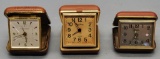 3 Vintage Travel Clocks - 1 Has Leather Cover