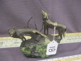 Bronze Wolfes On Stone