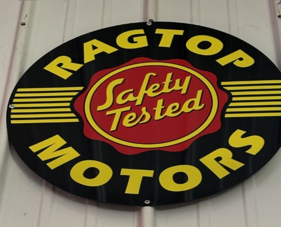 Ragtop Motors metal advertising sign