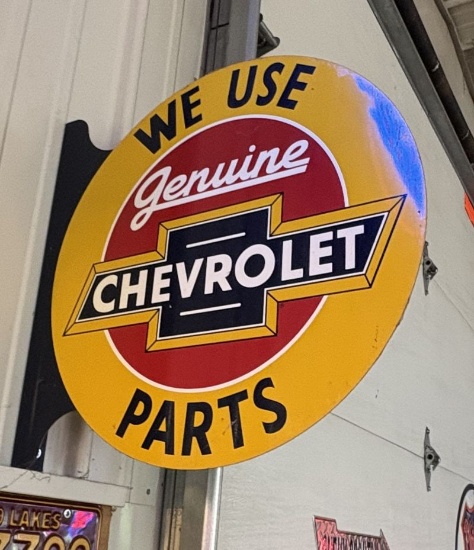 We Use Genuine Chevrolet Parts metal flange sign