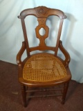 Antique Walnut Victorian Hip Rest Chair with Cane Bottom