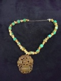 Turquoise and Stone Necklace with Carved Stone Pendant