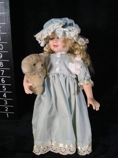 Porcelain Baby Doll with Teddy Bear