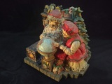 Contemporary Resin Christmas Figurine-Santa and Mrs Claus View the World