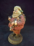 Contemporary Resin Christmas Figurine-Fat Santa with Toys