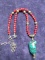 Red Beaded Necklace with Polished Pendant