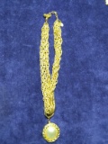 Multi Strand Gold tone Necklace with Faux Pearl Pendant