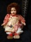 Porcelain Doll with Checkered Dress