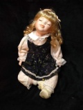 Porcelain Doll with Corduroy Dress, Sitting