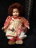 Porcelain Doll with Checkered Dress
