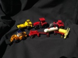 Collection of Assorted Miniature Tractor Toys and Accessories