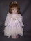 Porcelain Baby Doll Girl with Pink Dress