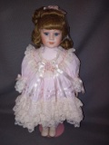 Porcelain Baby Doll Girl with Pink Dress