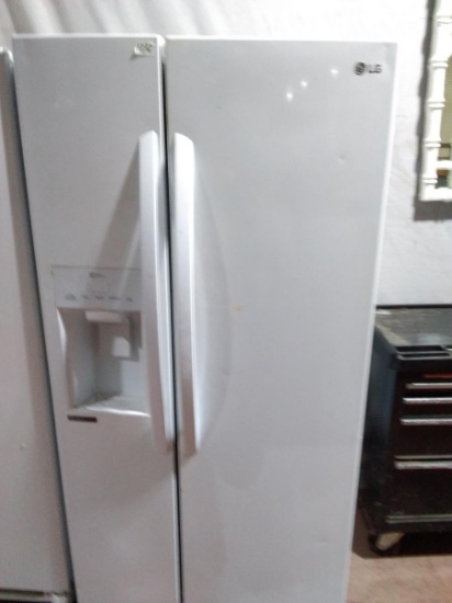 LG Side By Side Refrigerator with Water Dispenser-as is