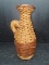 Pottery Jug with Wicker Overlay