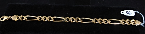 ONE STAMPED AND TESTED 14K YELLOW GOLD MEN'S  FIGARO-STYLE LINK BRACELET. 8