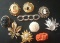 10 BROOCHES