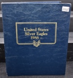 13 DIFFERENT DATE AMERICAN SILVER EAGLES IN BOOK
