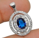 2CT BLUE SAPPHIRE AND TOPAZ PENDENT
