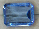 11.86 Carat Emerald Cut Blue Topaz