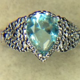 .925 sterling silver ladies 4 carat blue Topaz ring