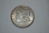 Coins. 1900 Morgan Silver Dollar.