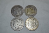 Coins. 4 Morgan Silver Dollars.