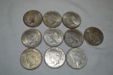 Coins. 10 Peace Silver Dollars.
