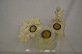 Three Piece Porcelain Alarm Clocks.