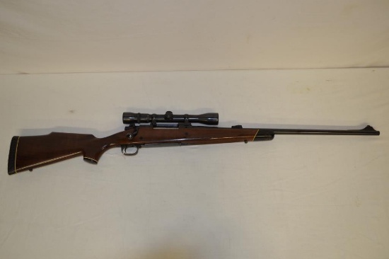 Gun. Winchester Model 70 7mm mag cal Rifle